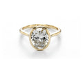 Front view of a 2 CT oval cut lab grown diamond solitaire engagement ring in a solid yellow gold full bezel setting.