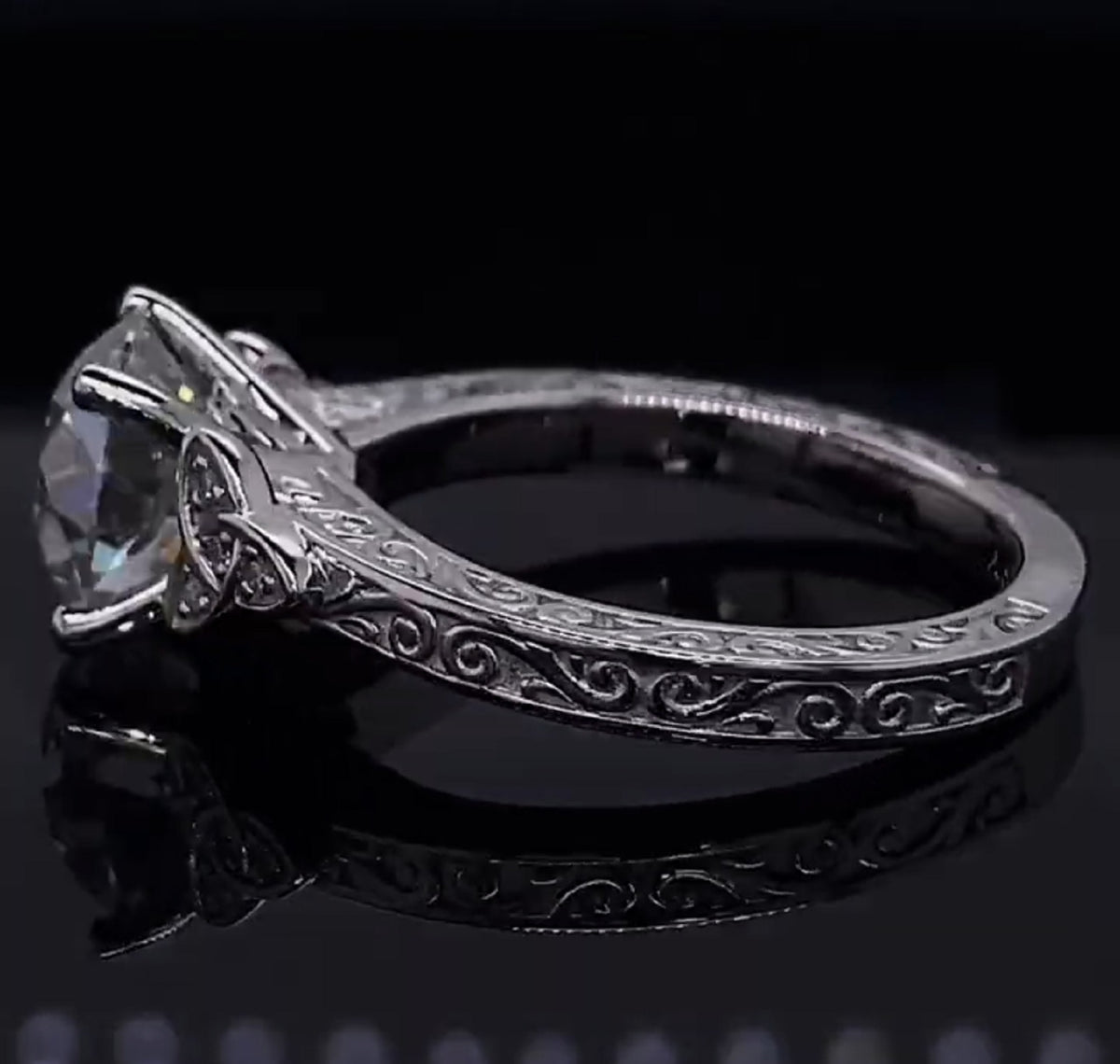 Profile view of vintage style engagement ring featuring 2CT round lab diamond