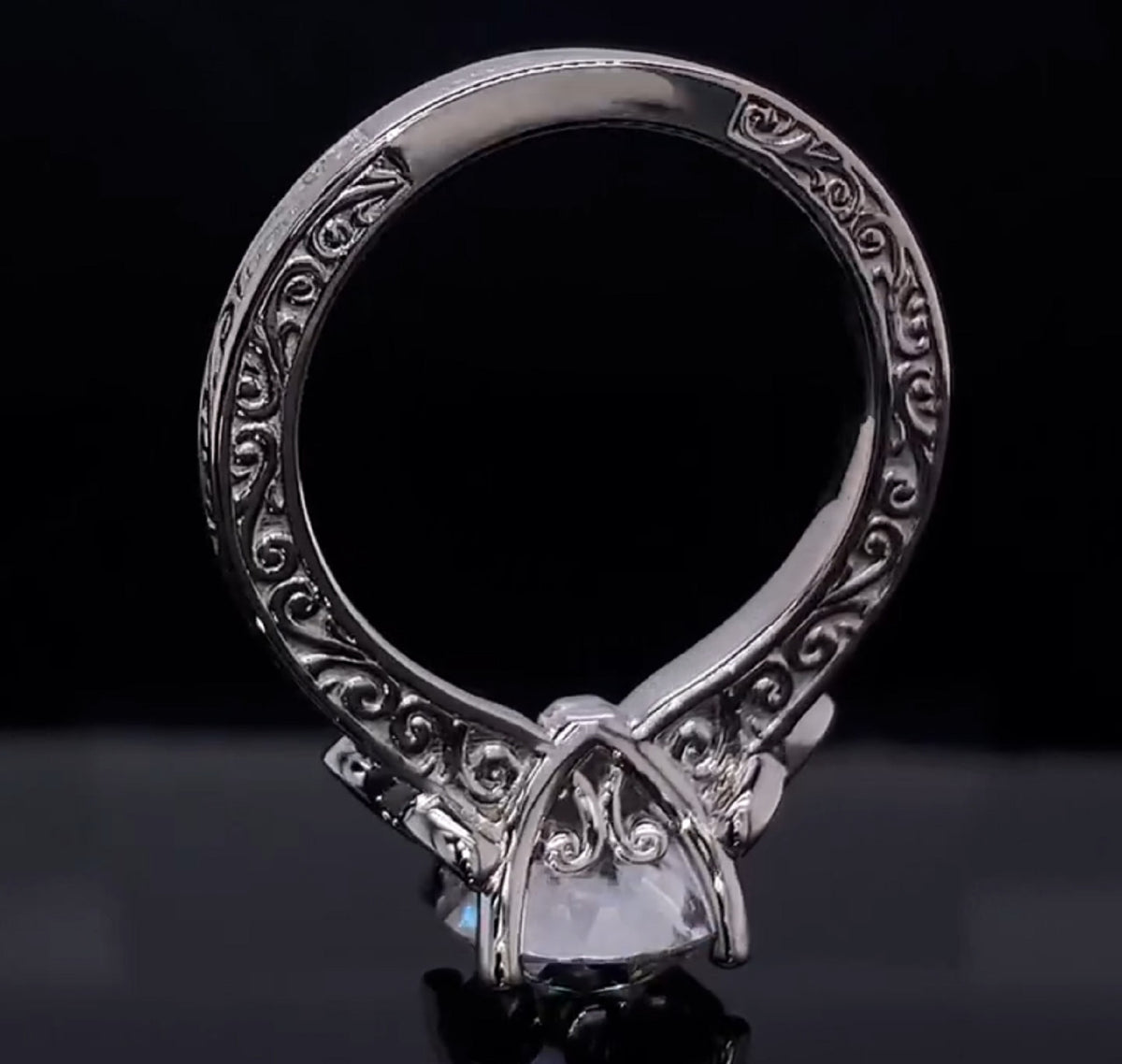 Underside and scrollwork detail of 2 carat round lab grown diamond ring