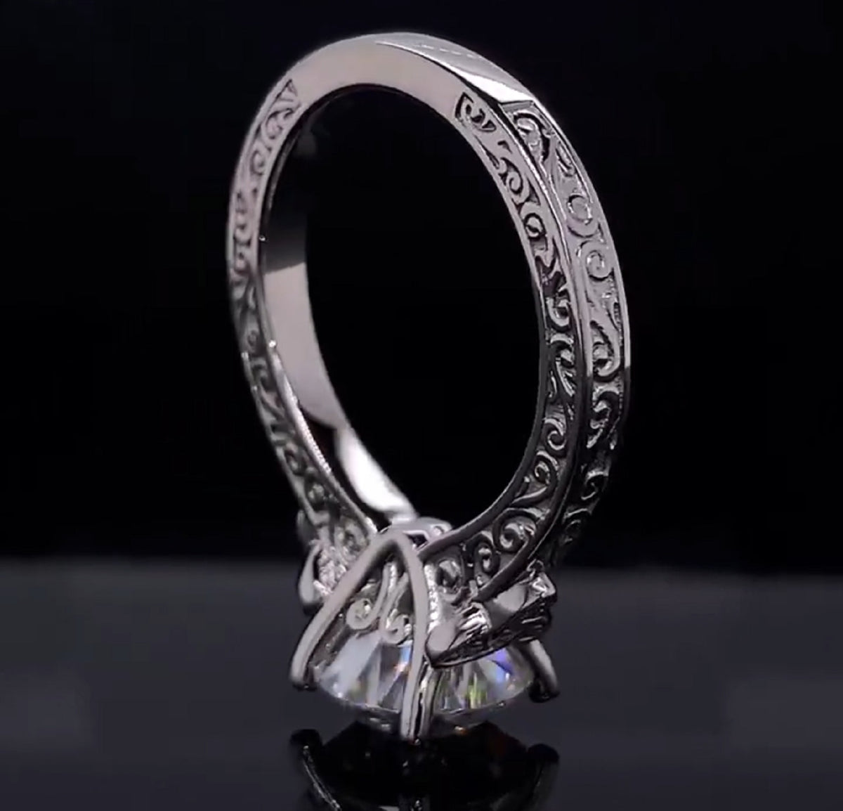 Intricate basket setting detail under 2 CT round brilliant lab diamond