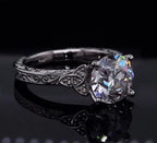 2 CT round cut lab grown diamond ring showcasing sparkle and detailed engraving