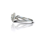 Side view showing the split shank crossover band of a 3 carat round lab diamond ring