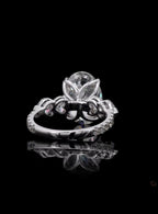Back view of a 4 carat oval lab grown diamond engagement ring featuring a tulip petal basket and pave band
