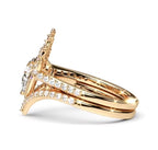 A rose gold engagement ring with a starburst cluster of clear gemstones, shown in a three-quarter side view on a clean white background.