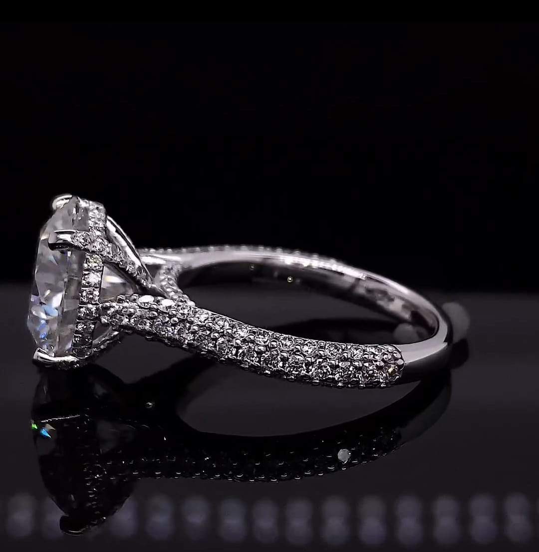 Close up side view showing multi-row micro pave setting on white gold engagement ring