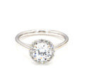 Top-down view of a 2 carat round cut lab grown diamond engagement ring with halo