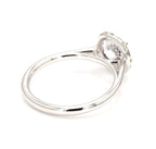 Perspective view of a white gold 2 ct round lab diamond halo engagement ring