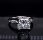 Front view of a 3 carat princess cut lab grown diamond engagement ring with pave band
