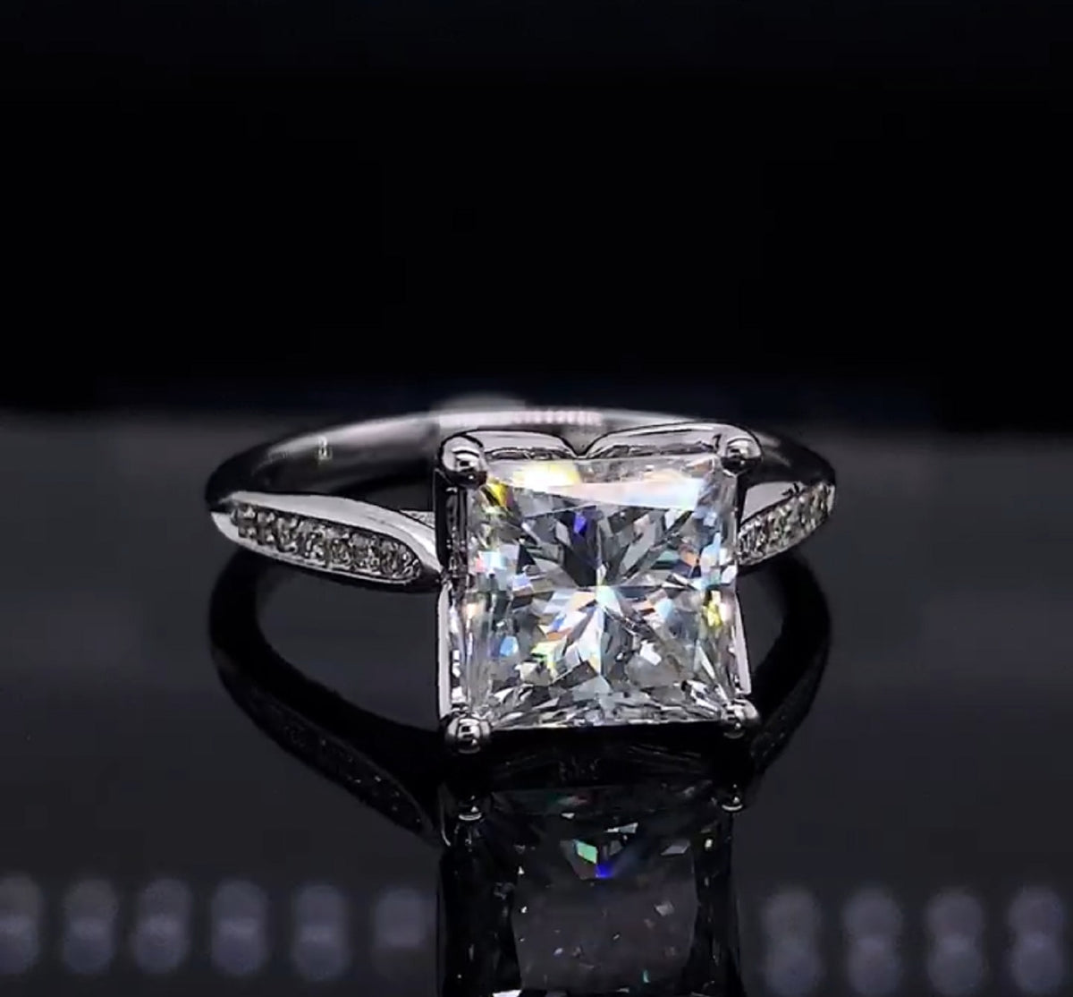 Front view of a 3 carat princess cut lab grown diamond engagement ring with pave band