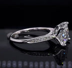 Side profile view highlighting the cathedral setting and pave shank of 3ct diamond ring
