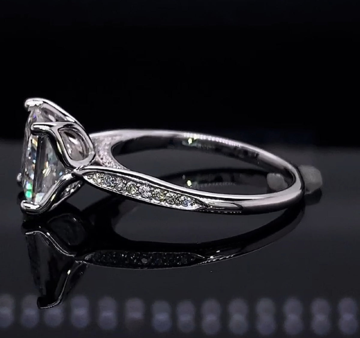 Detailed profile view showing 4-prong setting and pavé channel of 3ct diamond ring
