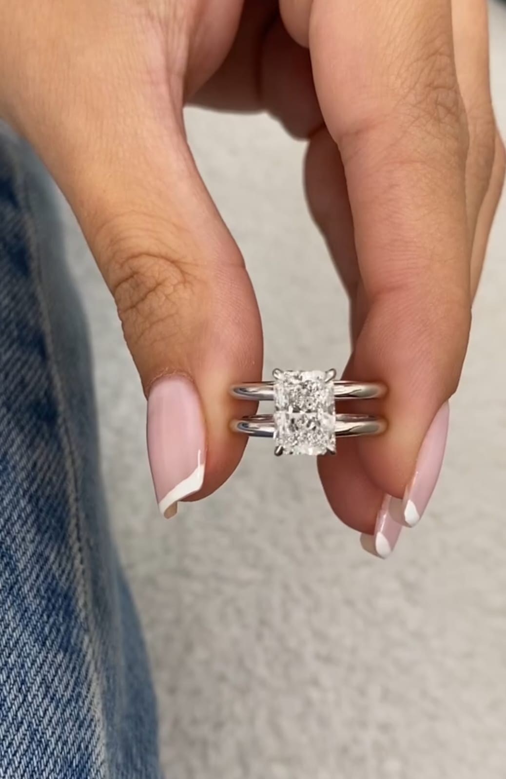 Front view of 2 CT radiant cut lab grown diamond engagement ring with double band