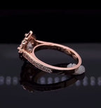 Side angle view showing pavé diamond band on rose gold 3 CT lab diamond ring