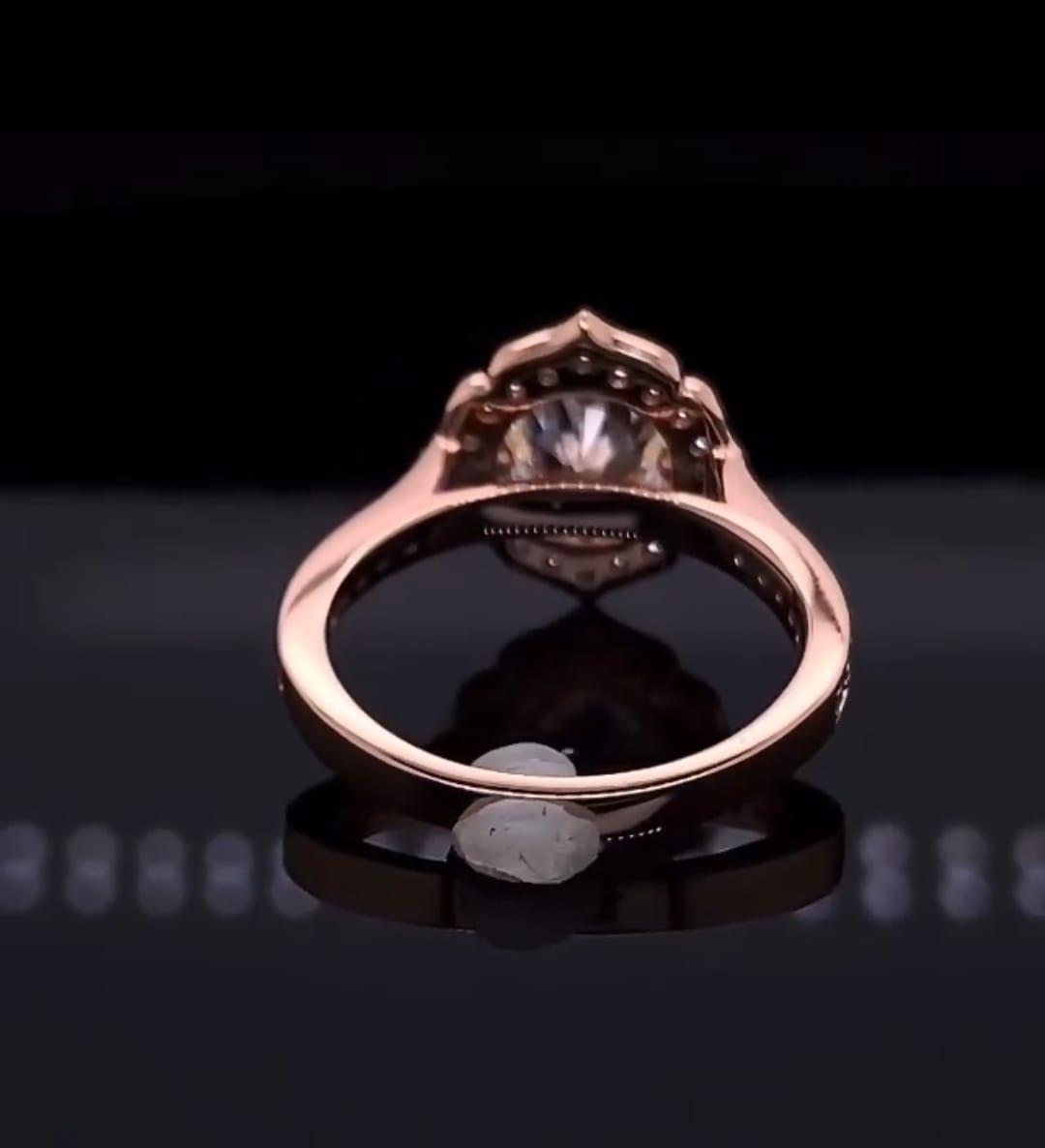 Underneath gallery view of rose gold vintage floral halo engagement ring