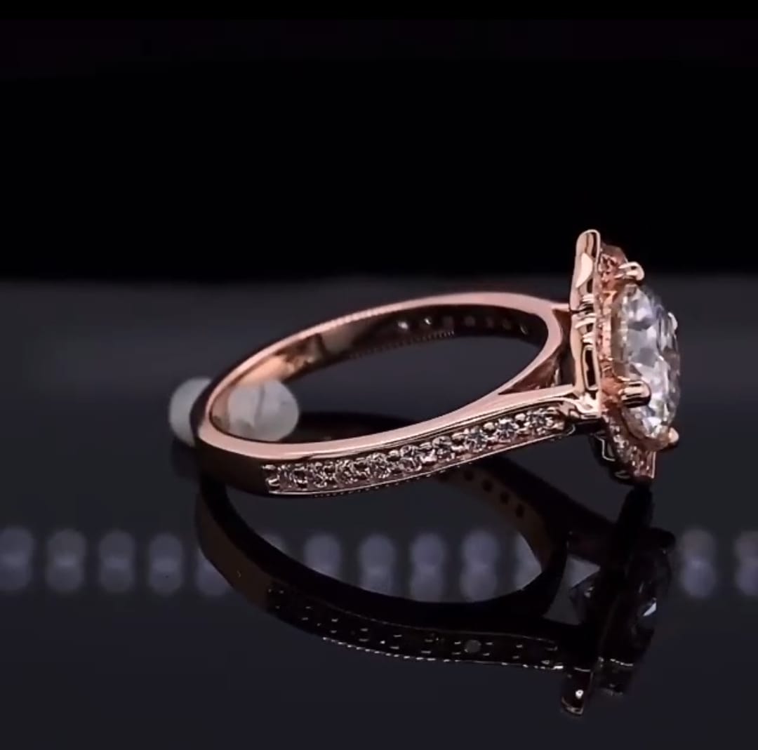 Side view displaying pavé accent diamonds on rose gold band