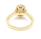 Undergallery view highlighting diamond-encrusted ornate basket and yellow gold band