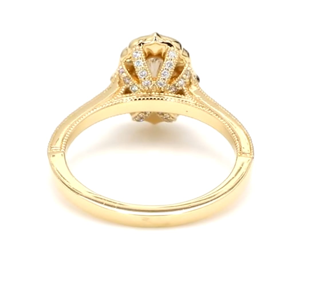 Undergallery view highlighting diamond-encrusted ornate basket and yellow gold band