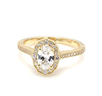 Front view of 2 CT oval cut lab diamond ring with yellow gold scalloped halo and pave band