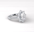 Angled top view of the 2 CT oval diamond ring emphasizing the brilliance of the center stone and halo.