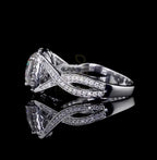 Side angle view of the 2 carat cushion cut lab diamond ring showing the elegant twisted split shank.