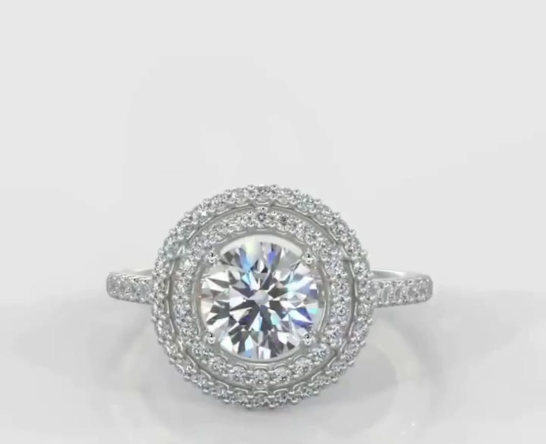 Direct top-down view of a stunning 3 CT round cut lab grown diamond ring highlighting the concentric double halo design.