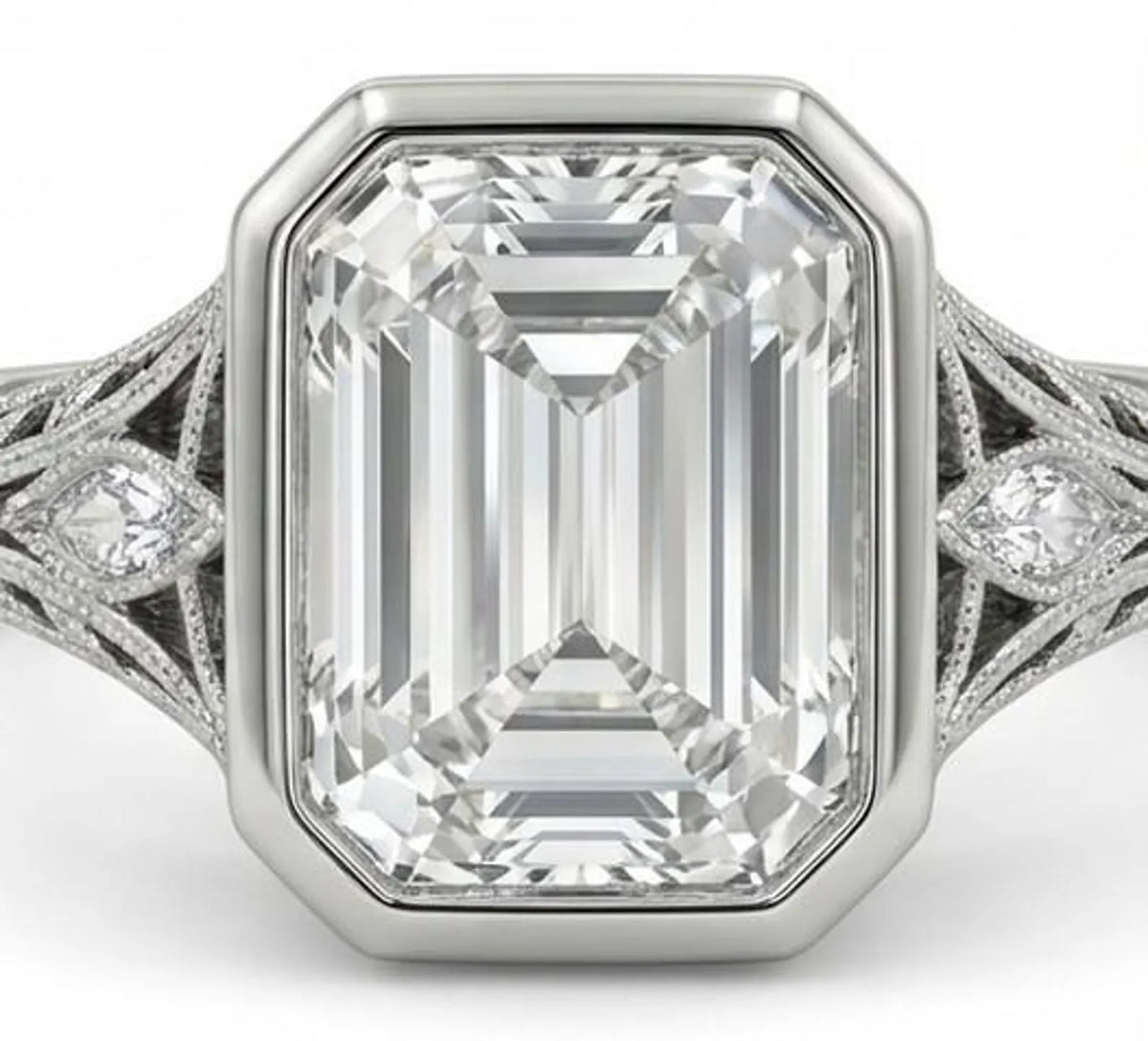 Close up top view of a 5 CT emerald cut lab grown diamond in a secure bezel setting with milgrain edges.
