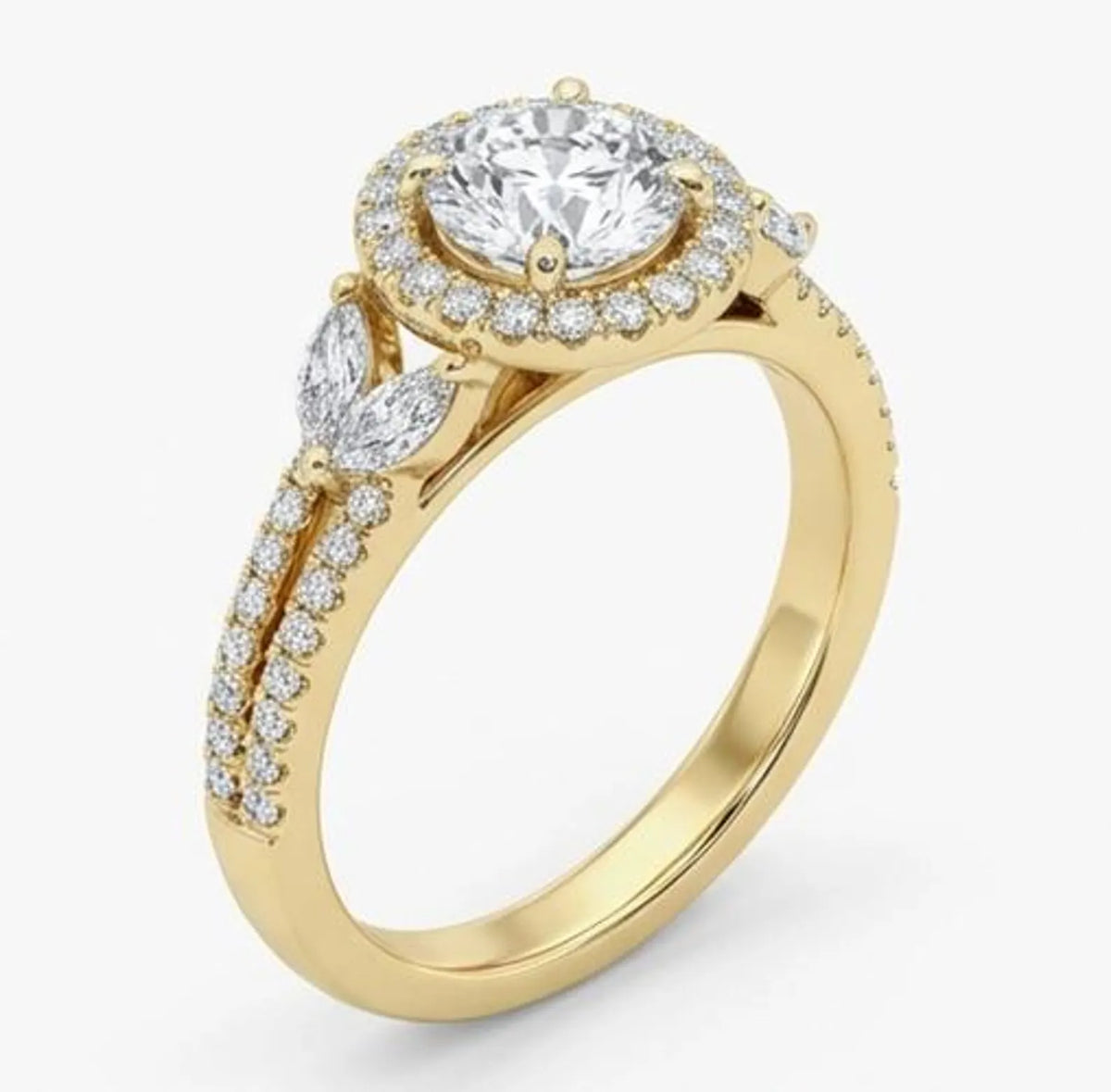Angled view of a 2 carat round cut lab grown diamond halo engagement ring with a yellow gold pave split shank.