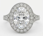 Top-down view of a 3 carat oval cut lab grown diamond halo engagement ring with vintage milgrain details.