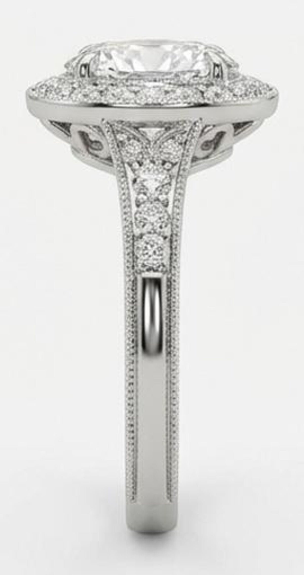 Side profile of a 3 CT oval cut lab grown diamond halo ring showcasing the diamond-encrusted pave band and gallery details.