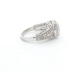 Side view showing the detailed carved leaf pattern running along the ring's shank.