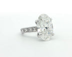 4 carat oval cut lab grown diamond ring with hand-engraved filigree band front angled view