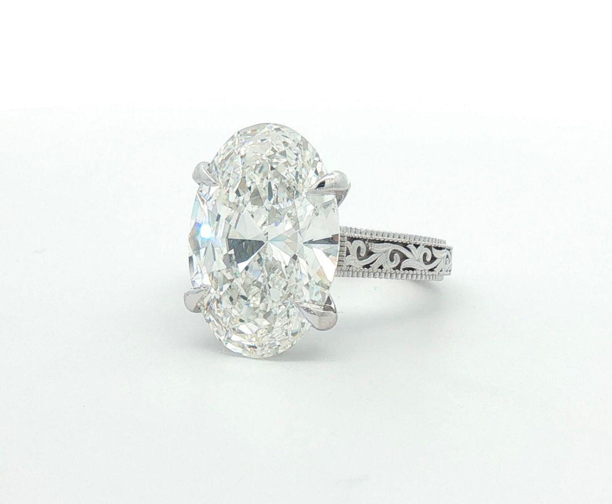 Front view of 4 CT oval cut solitaire lab created diamond engagement ring