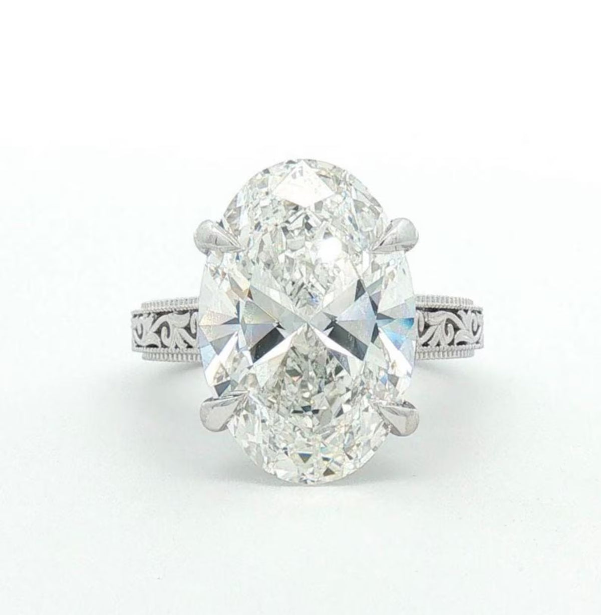 Direct top-down view of brilliant 4 CT oval cut lab grown diamond solitaire