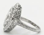 Side profile of 3 carat marquise lab grown diamond ring with filigree under gallery and hand engraved band