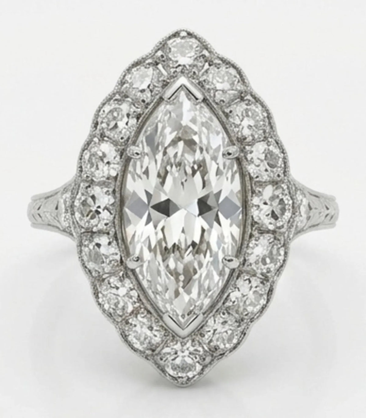Top down view of 3 CT marquise cut lab grown diamond engagement ring with scalloped diamond halo
