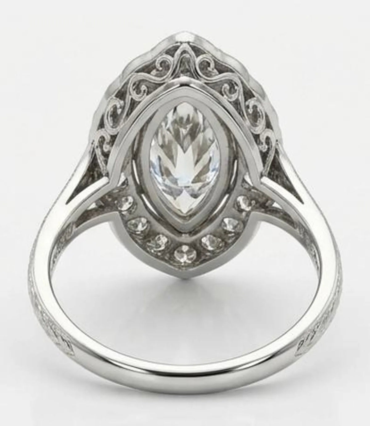 Underneath view of vintage 3 carat marquise diamond ring showing ornate scrollwork gallery