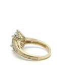 Top-down front view of 3 CT oval cut lab grown diamond in yellow gold vintage filigree setting.