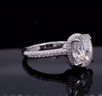 Side angle view showing multi-row micro-pavé diamond band on a cushion cut lab grown diamond ring.