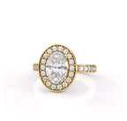 Front view of 2 carat oval cut lab grown diamond halo engagement ring with pave yellow gold band