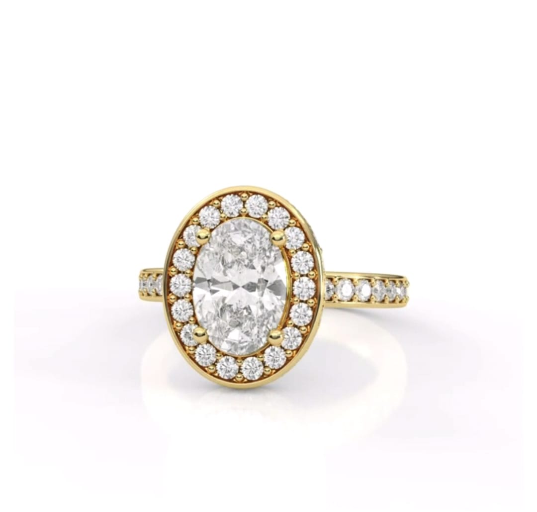 Front view of 2 carat oval cut lab grown diamond halo engagement ring with pave yellow gold band
