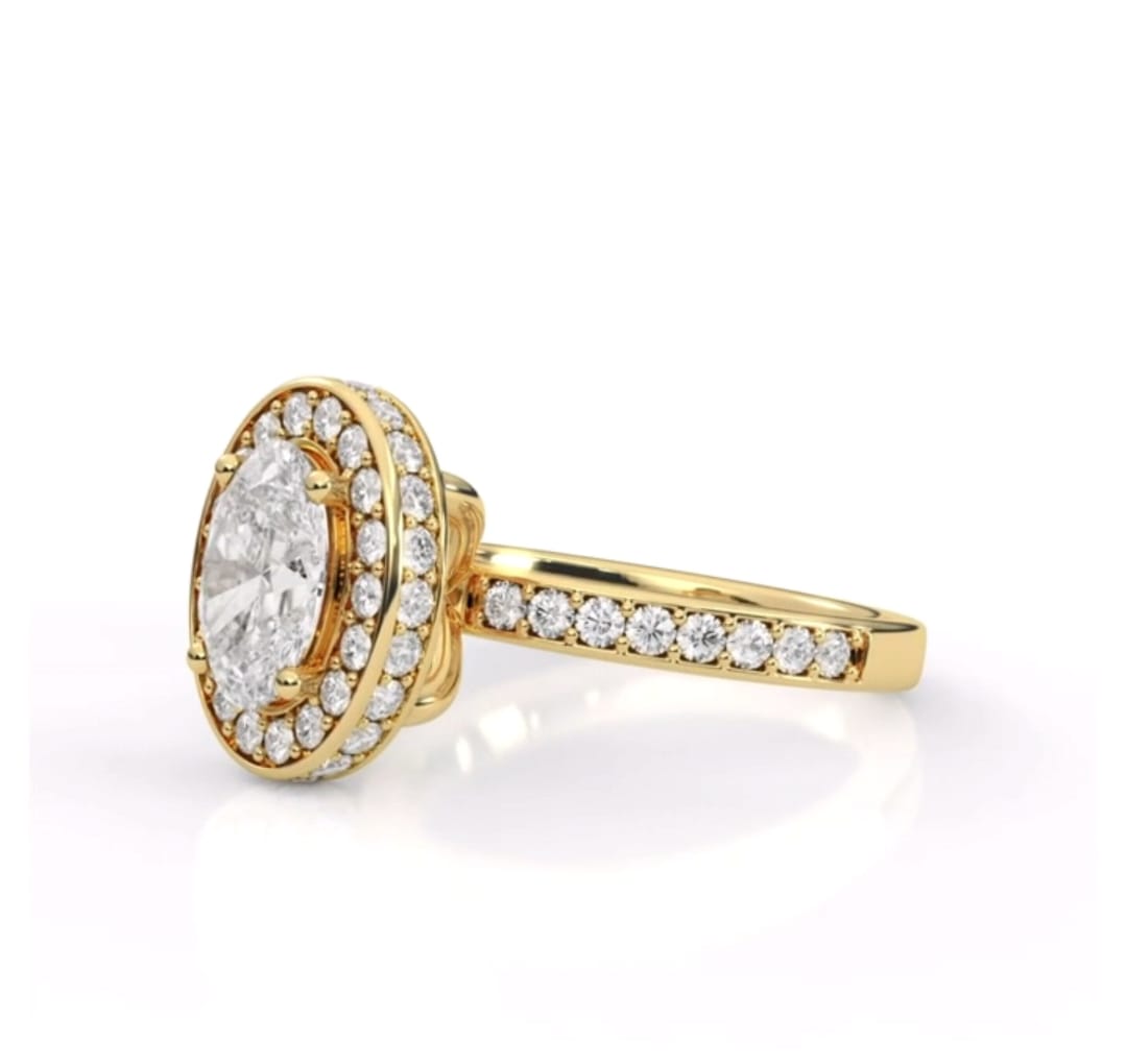 Angled view of 2ct oval lab diamond halo ring showcasing pave accent setting in yellow gold