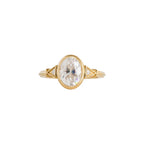 Top view of yellow gold 2 CT oval cut lab diamond engagement ring with milgrain bezel and side accents.