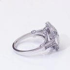 Side profile view of cushion cut lab diamond ring displaying cathedral setting, micro-pavé bridge, and milgrain details.