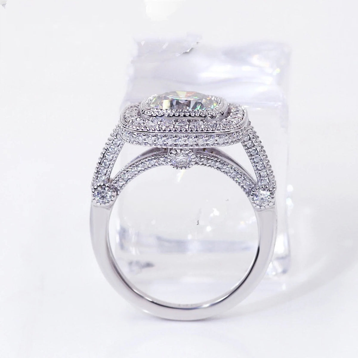 Under-gallery arch view of double halo lab grown diamond engagement ring showing detailed pavé bridge setting.