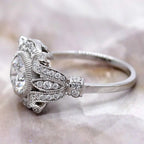 Side profile view of a 2 CT round lab grown diamond ring with vintage filigree, leaf motifs, and milgrain accents.
