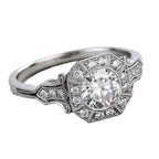 Close-up 3/4 view highlighting geometric halo facets and micro-pavé details of 2 CT round lab diamond ring.