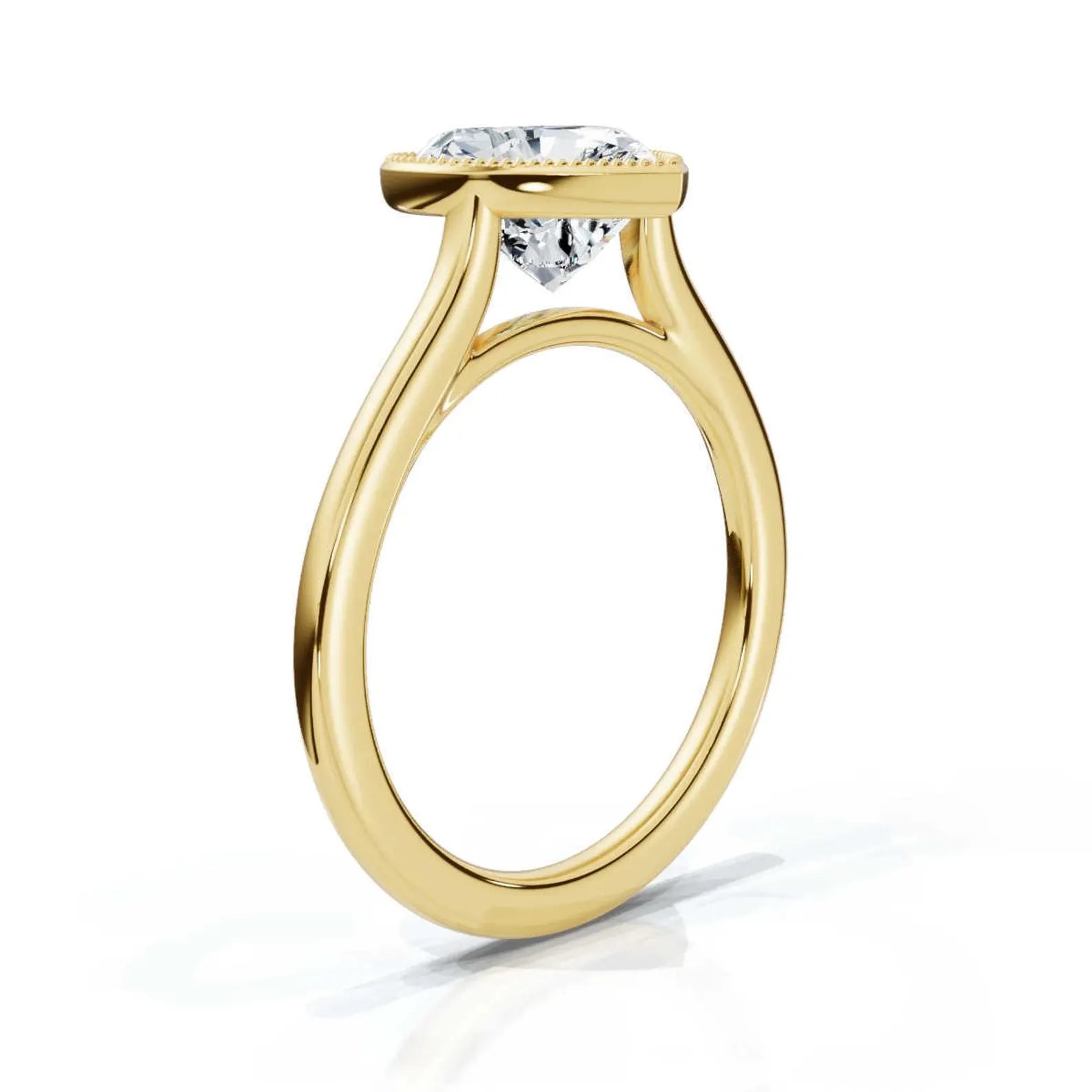 Elevated 3/4 studio view showcasing the open basket setting beneath the heart-shaped milgrain bezel ring.