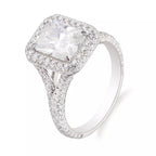 Perspective view of a 3 carat radiant cut lab diamond halo engagement ring showcasing the sparkling split shank.