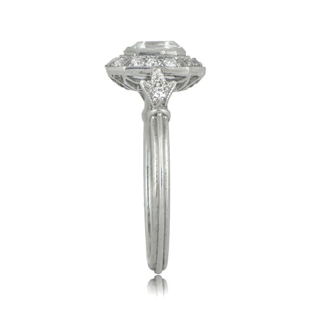 Detailed side-angle shot showing the geometric shoulder motif and grooved band on a 2 Carat Asscher lab diamond halo ring.