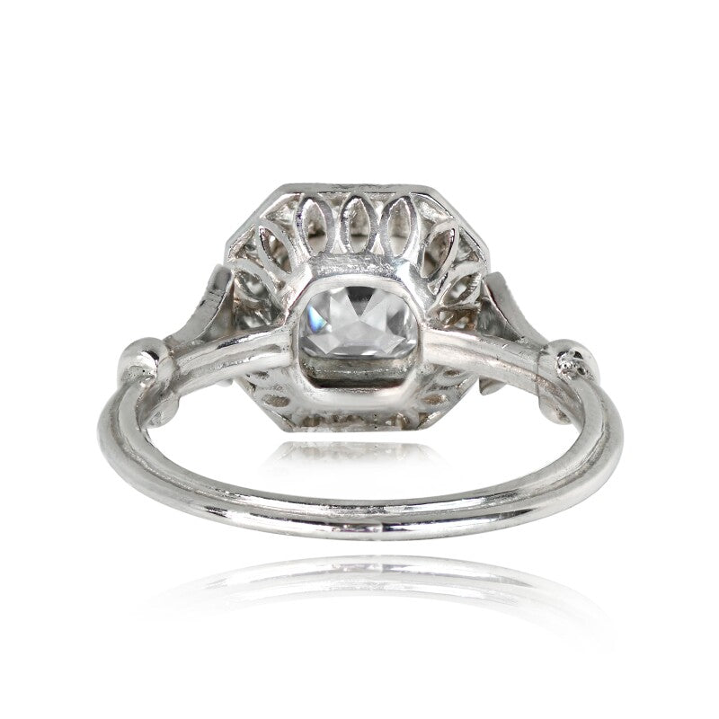 Under-gallery perspective showing the geometric latticework cutout pattern beneath a 2 carat Asscher cut lab diamond halo ring.